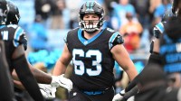 Carolina Panthers center Austin Corbett (63) runs on to the field before the game at Bank of America Stadium.