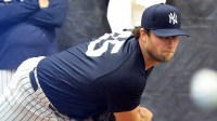 New York Yankees pitcher Gerrit Cole (45) throws a bullpen session during spring training practices at George M. Steinbrenner Field