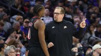Philadelphia 76ers head coach Nick Nurse and guard Tyrese Maxey talk during the third quarter against the Los Angeles Lakers at Xfinity Mobile Arena.