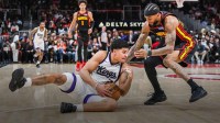 Sacramento Kings guard Killian Hayes (3) fights for the ball against Atlanta Hawks guard Nickeil Alexander-Walker (7) during the fourth quarter at State Farm Arena.