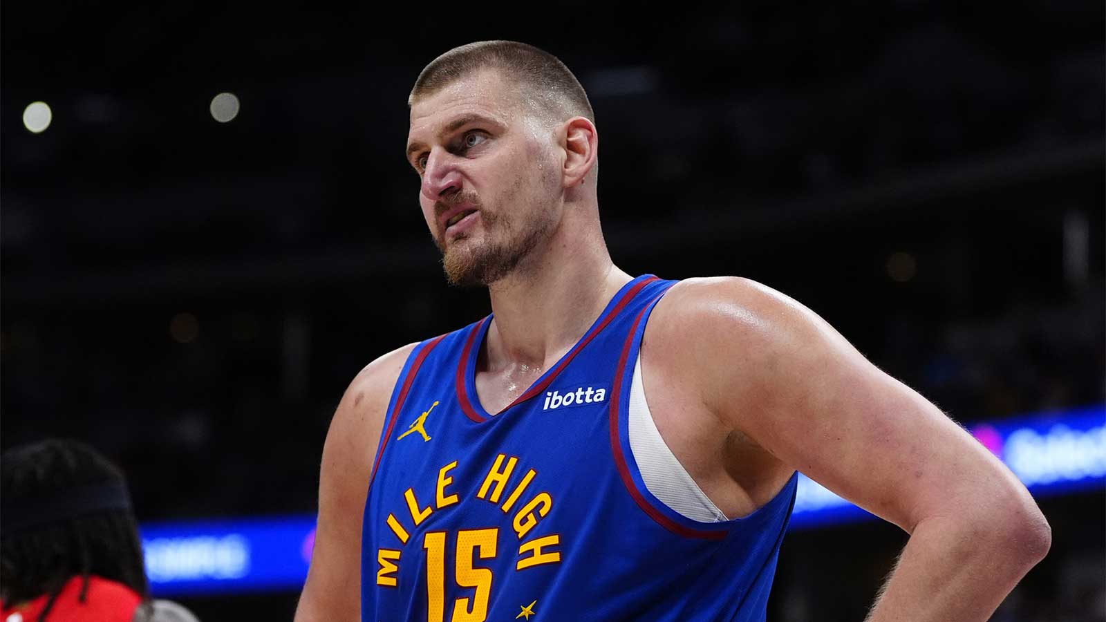 Denver Nuggets center Nikola Jokic (15) looks on in the second half against the Portland Trail Blazers at Ball Arena. 