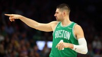 Boston Celtics center Nikola Vucevic (4) reacts against the Phoenix Suns in the first half at Mortgage Matchup Center.
