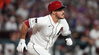 Arizona Diamondbacks' Nolan Arenado (28) hits a single against the Detroit Tigers at Chase Field.