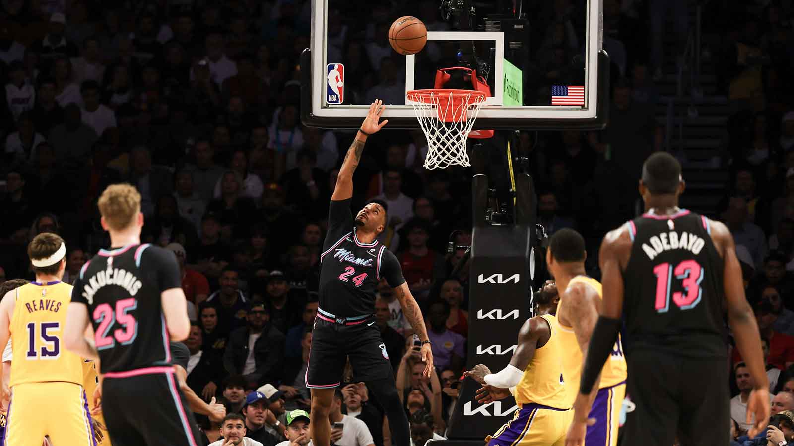 Miami Heat guard Norman Powell (24) shoots over Los Angeles Lakers center Deandre Ayton (5) during first half at Kaseya Center. 