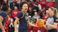 Notre Dame guard Hannah Hidalgo (3) celebrates stealing the ball and drawing a foul against Louisville in the KFC Yum! Center. March 1, 2026