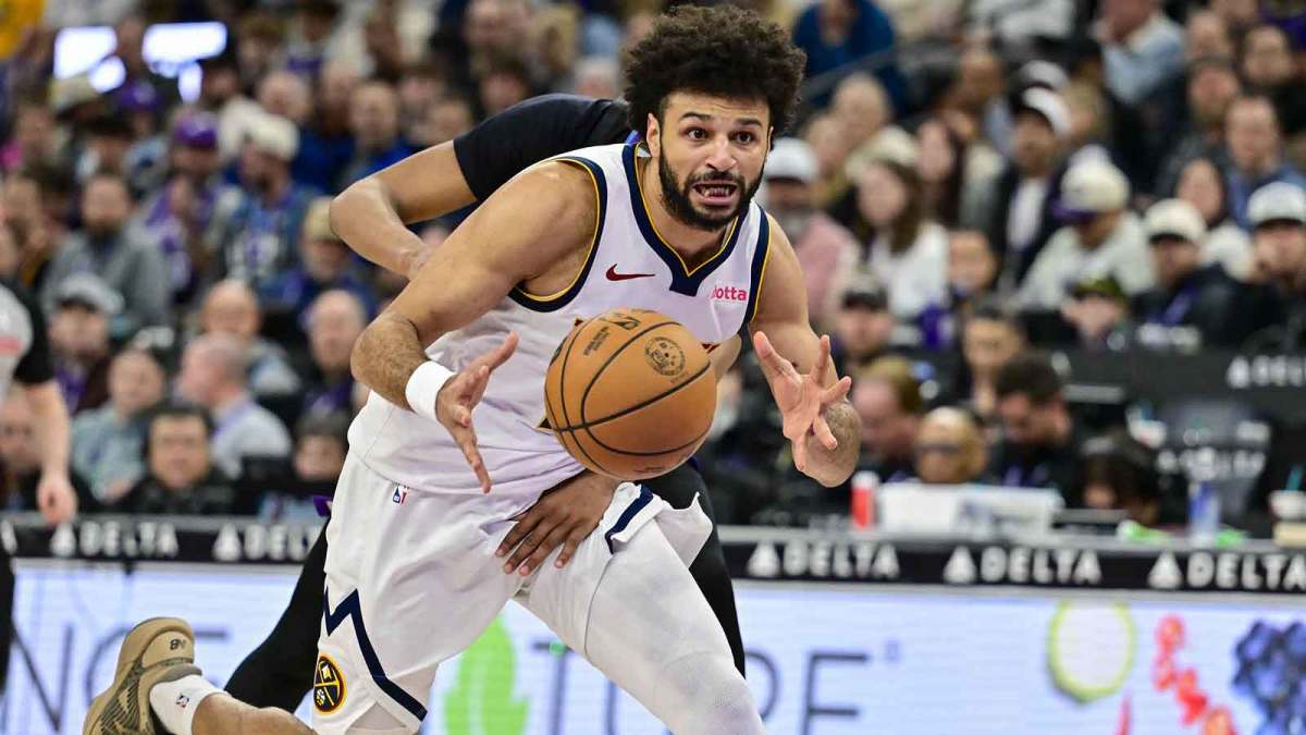 Nuggets guard Jamal Murray (27) controls the ball
