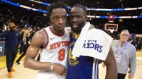 New York Knicks forward OG Anunoby (8) and Golden State Warriors forward Draymond Green (23) speak following their game at Chase Center.