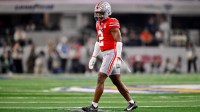 Ohio State Buckeyes safety Caleb Downs (2) gets into position during the 2025 Cotton Bowl and quarterfinal game of the College Football Playoff at AT&T Stadium.