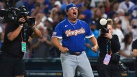 Venezuela manager Omar Lopez (22) celebrates after winning the quarterfinal game of the 2026 World Baseball Classic against Japan at loanDepot Park.