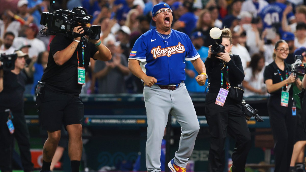 Venezuela manager Omar Lopez (22) celebrates after winning the quarterfinal game of the 2026 World Baseball Classic against Japan at loanDepot Park.