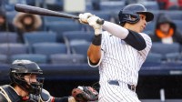 New York Yankees third base Oswaldo Cabrera (95) hits a single against the San Francisco Giants during the second inning at Yankee Stadium.