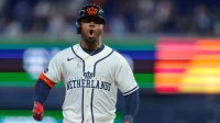 Netherlands second baseman Ozzie Albies (1) rounds the bases after hitting a three-run home run against Nicaragua during the ninth inning at loanDepot Park.