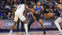 Orlando Magic forward Paolo Banchero (5) handles the ball in front of Indiana Pacers forward Jarace Walker (5) during the first quarter at Kia Center.