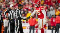 Kansas City Chiefs defensive tackle Chris Jones (95) greets the officials at GEHA Field at Arrowhead Stadium.