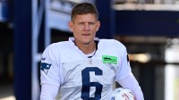 New England Patriots place kicker Nick Folk (6) heads to the practice fields at training camp at Gillette Stadium.
