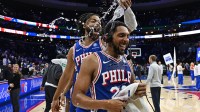 Philadelphia 76ers guard Cameron Payne (20) has water poured on him by forward Trendon Watford (12) after win against the Memphis Grizzlies at Xfinity Mobile Arena.