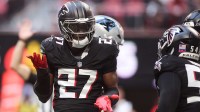 Atlanta Falcons edge James Pearce Jr. (27) reacts after a defensive stop in the first quarter against the Carolina Panthers at Mercedes-Benz Stadium.
