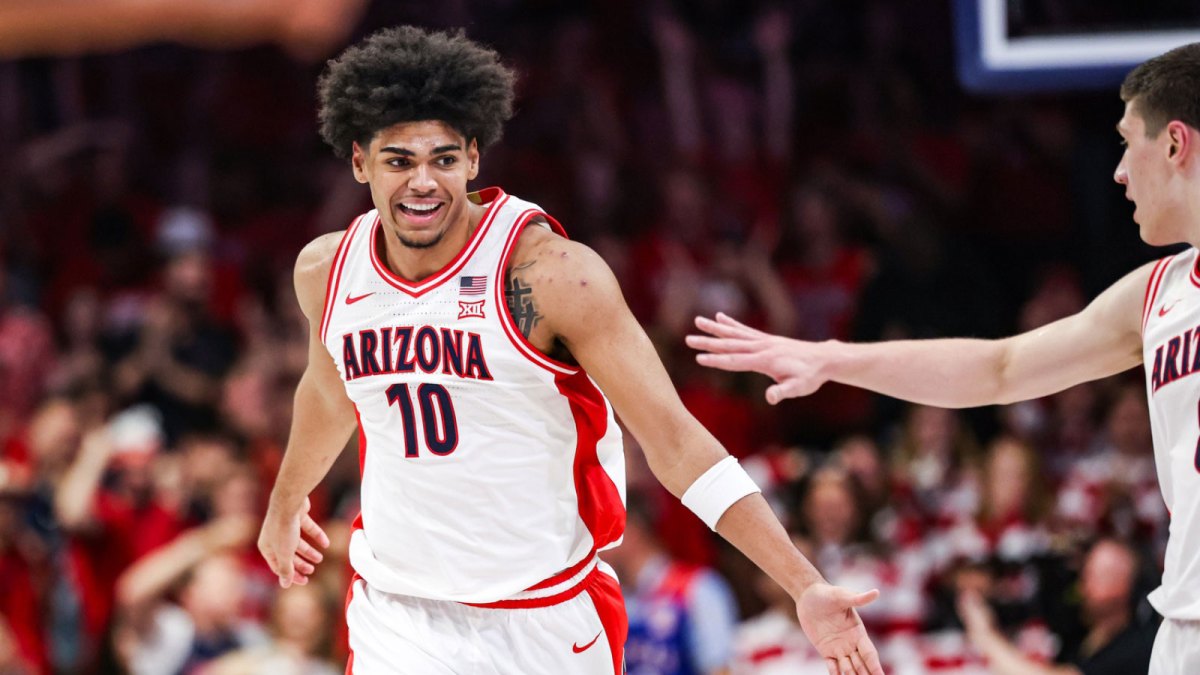 Arizona Wildcats forward Koa Peat (10) celebrates during the first half of the game against the Kansas Jayhawks at McKale Memorial Center.