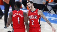 Pelicans guard Lonzo Ball (2) celebrates after forward Zion Williamson