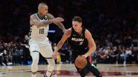 Miami Heat guard Pelle Larsson (9) drives to the basket against Milwaukee Bucks forward Kyle Kuzma (18) during the fourth quarter at Kaseya Center.