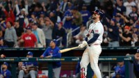 United States first baseman Bryce Harper (24) hits a two run home run against Venezuela in the eighth inning during the 2026 World Baseball Classic Championship game at loanDepot Park.