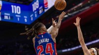 Pistons Daniss Jenkins (24) shoots a big two point basket vs. Lakers