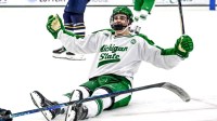 Michigan State's Porter Martone celebrates his empty net goal against Notre Dame during the third period on Thursday, Feb. 19, 2026, at the Munn Ice Arena in East Lansing.