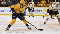 Nashville Predators defenseman Roman Josi (59) skates with the puck against the Boston Bruins during the first period at Bridgestone Arena.