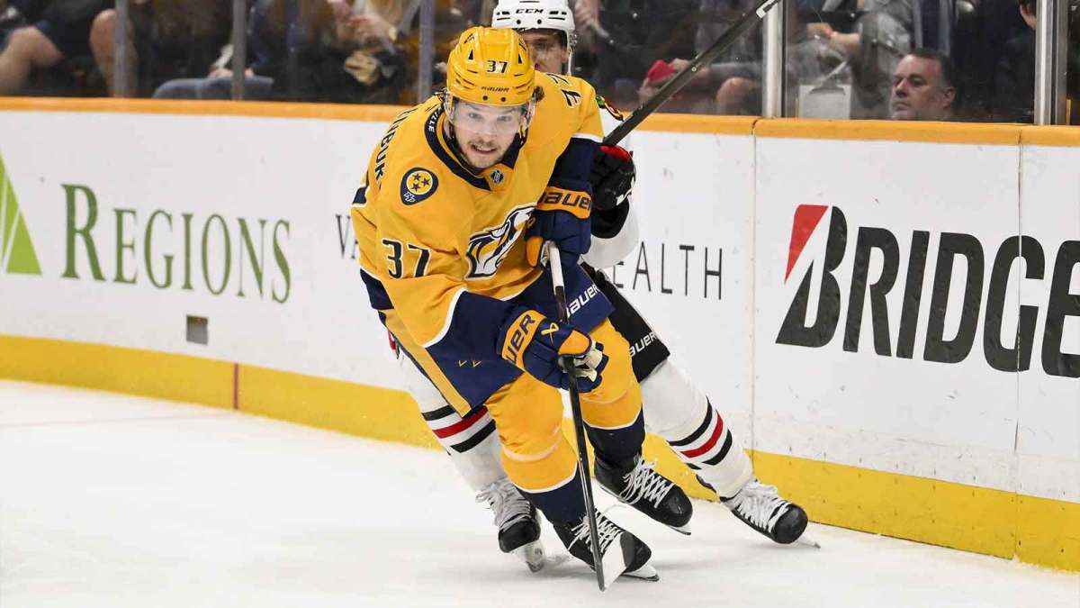 Nashville Predators defenseman Nick Blankenburg (37) skates with the puck against the Chicago Blackhawks during the second period at Bridgestone Arena
