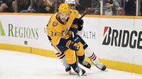 Nashville Predators defenseman Nick Blankenburg (37) skates with the puck against the Chicago Blackhawks during the second period at Bridgestone Arena