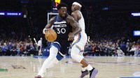 Minnesota Timberwolves forward/center Julius Randle (30) drives around Oklahoma City Thunder guard Luguentz Dort (5) during the second half at Paycom Center.