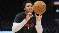 Toronto Raptors guard Scottie Barnes (4) receives a pass during warm up before a game against the New York Knicks at Scotiabank Arena.