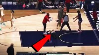 A ref gets knocked out during a Coastal Carolina Chanticleers-South Alabama Jaguars game