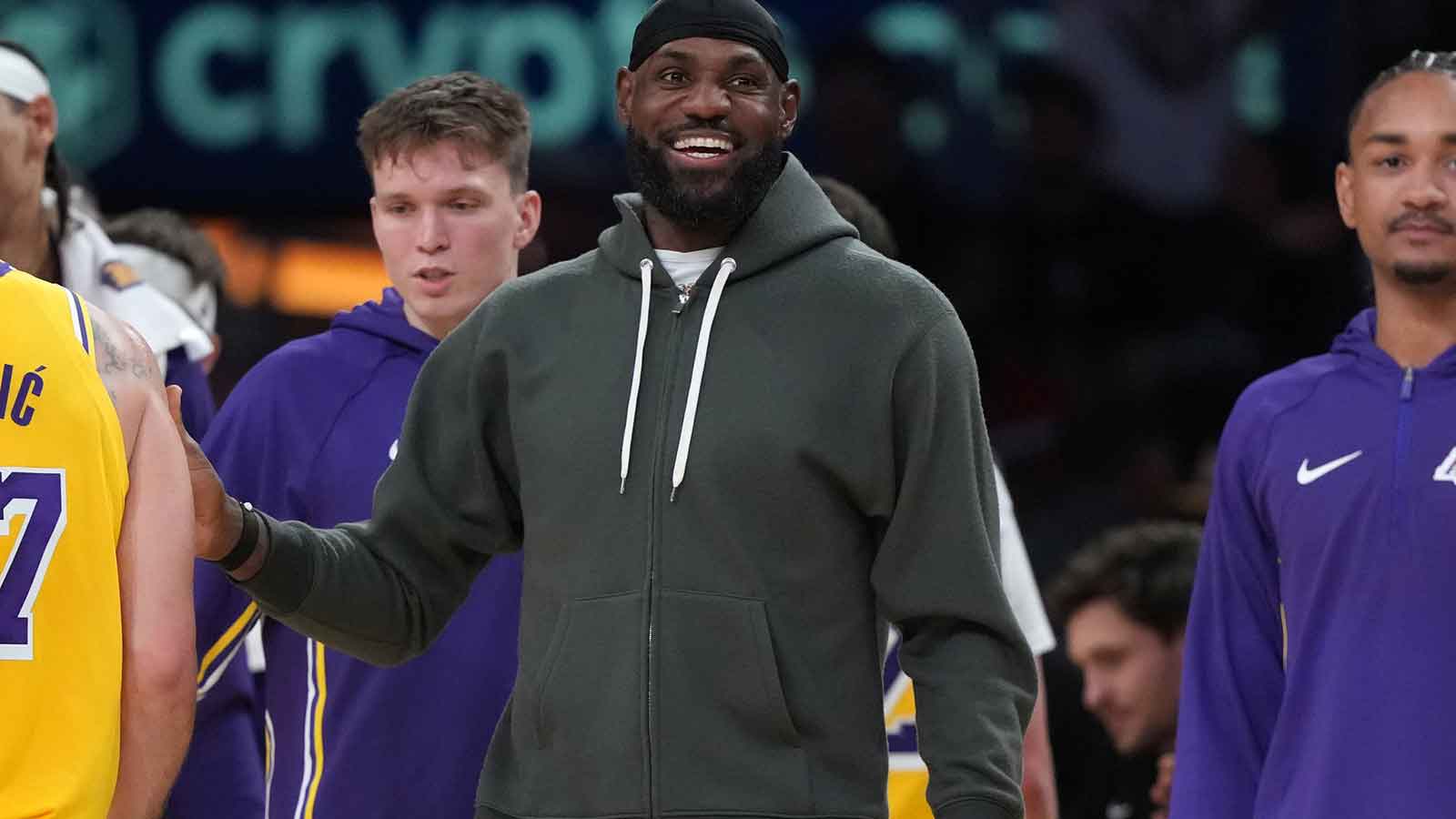 Los Angeles Lakers forward LeBron James watches from the bench against the Indiana Pacers at Crypto.com Arena.