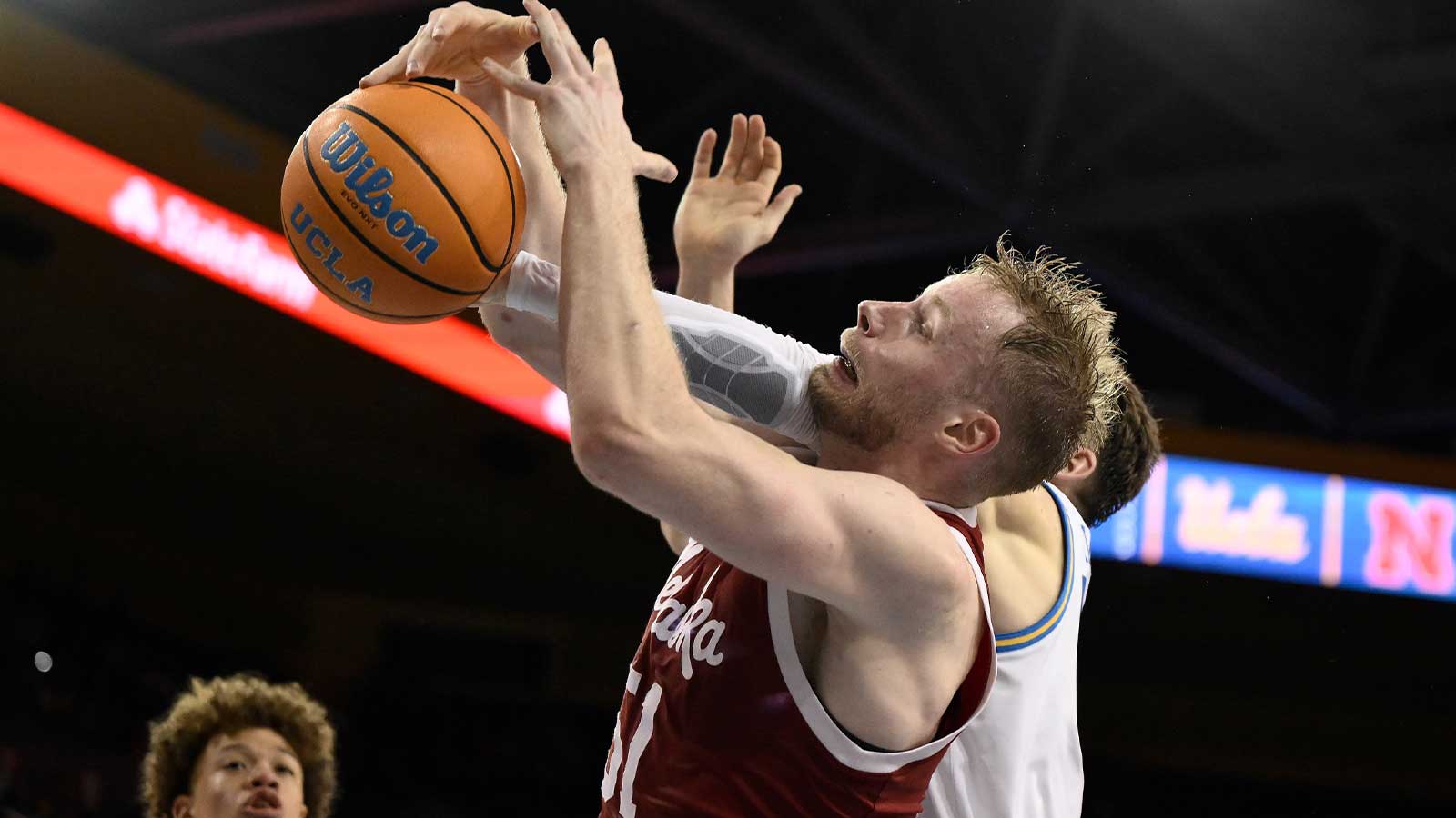 Nebraska Cornhuskers forward Rienk Mast (51) and UCLA Bruins forward Tyler Bilodeau (34) fight for a rebound during the second half at Pauley Pavilion presented by Wescom Financial.