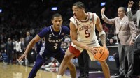 Arkansas Razorbacks guard Darius Acuff Jr. (5) drives against High Point Panthers guard Rob Martin (3) in the second half during a second round game of the men's 2026 NCAA Tournament at Moda Center.