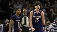 High Point Panthers guard Rob Martin (3) and forward Braden Hausen (15) react during the second half of a first round game of the men's 2026 NCAA Tournament against the Wisconsin Badgers at Moda Center.