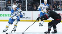 St. Louis Blues center Robert Thomas (18) moves the puck while defended by Seattle Kraken defenseman Adam Larsson (6) in the third period at Climate Pledge Arena.