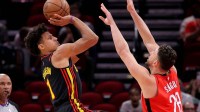 Atlanta Hawks forward Jalen Johnson (1) shoots against Houston Rockets center Alperen Sengun (28) during the first quarter at Toyota Center.