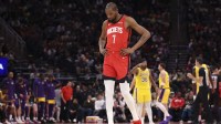 Rockets forward Kevin Durant (7) reacts after a play