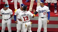 National League outfielder Ronald Acuna Jr. (13) of the Atlanta Braves greats National League designated hitter Shohei Ohtani (17) of the Los Angeles Dodgers before the 2025 MLB All Star Game at Truist Park.
