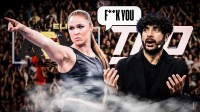 Ronda Rousey with Tony Khan, AEW and TKO Logos in the background