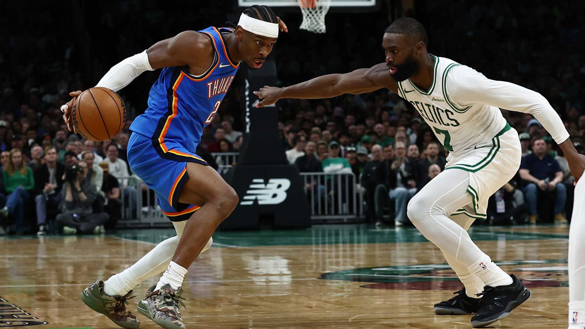 Thunder guard Shai Gilgeous-Alexander (2) looks to drive on Boston Celtics guard Jaylen Brown (7) during the second quarter at TD Garden