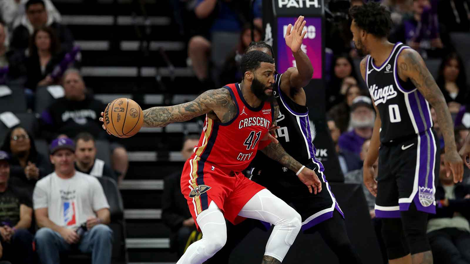 New Orleans Pelicans guard-forward Saddiq Bey (41) dribbles the ball while being defended by Sacramento Kings forward Precious Achiuwa (9) during the fourth quarter at Golden 1 Center.