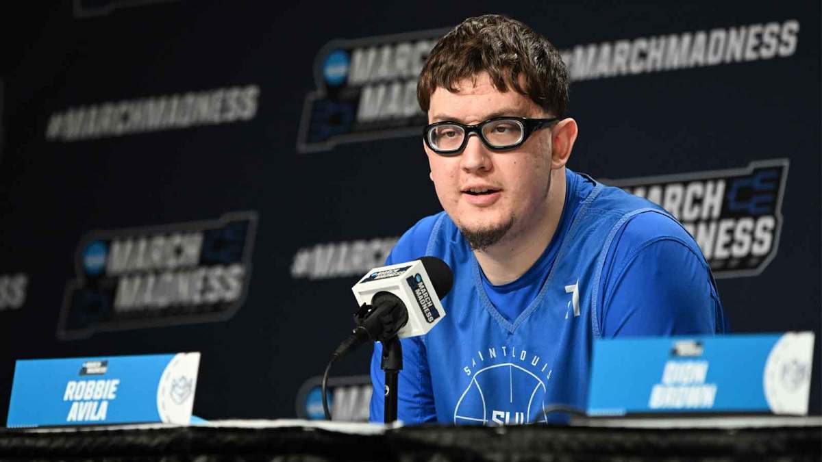 Saint Louis Billikens center Robbie Avila (21) speaks with the media before a practice session ahead of the first round of the men's 2026 NCAA Tournament at KeyBank Center.