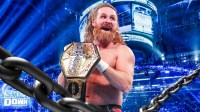 WWE Superstar Sami Zayn with the United States Championship, which he beat Carmelo Hayes to win, and Friday Night SmackDown background.