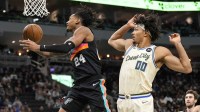 San Antonio Spurs guard Devin Vassell (24) shoots against Milwaukee Bucks center Jericho Sims (009) during the second quarter at Fiserv Forum.