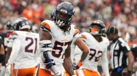 Denver Broncos linebacker Dre Greenlaw (57) reacts after a play during the first half against the Houston Texans at NRG Stadium.