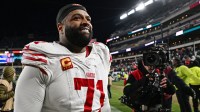 San Francisco 49ers offensive tackle Trent Williams (71) walks off the field after win against the Philadelphia Eagles in an NFC Wild Card Round game at Lincoln Financial Field.