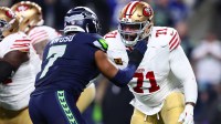 San Francisco 49ers offensive tackle Trent Williams (71) blocks Seattle Seahawks linebacker Uchenna Nwosu (7) during the first half in an NFC Divisional Round game at Lumen Field.